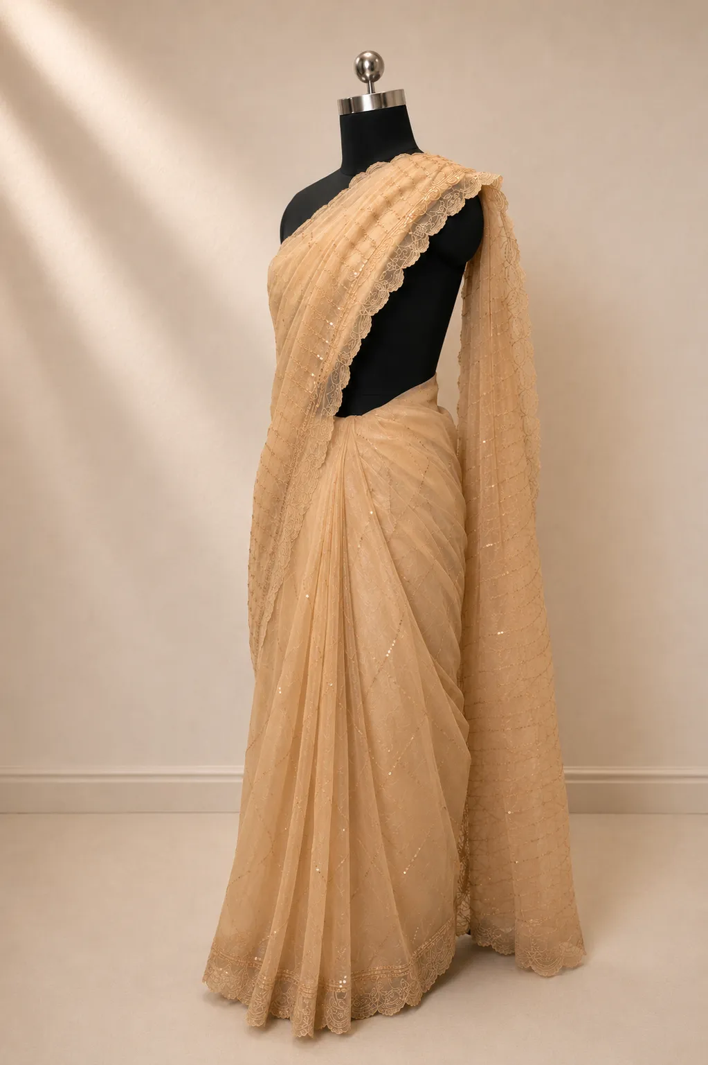 Elegant Champagne/Beige Net Saree with Shimmering Sequin Wave Embroidery