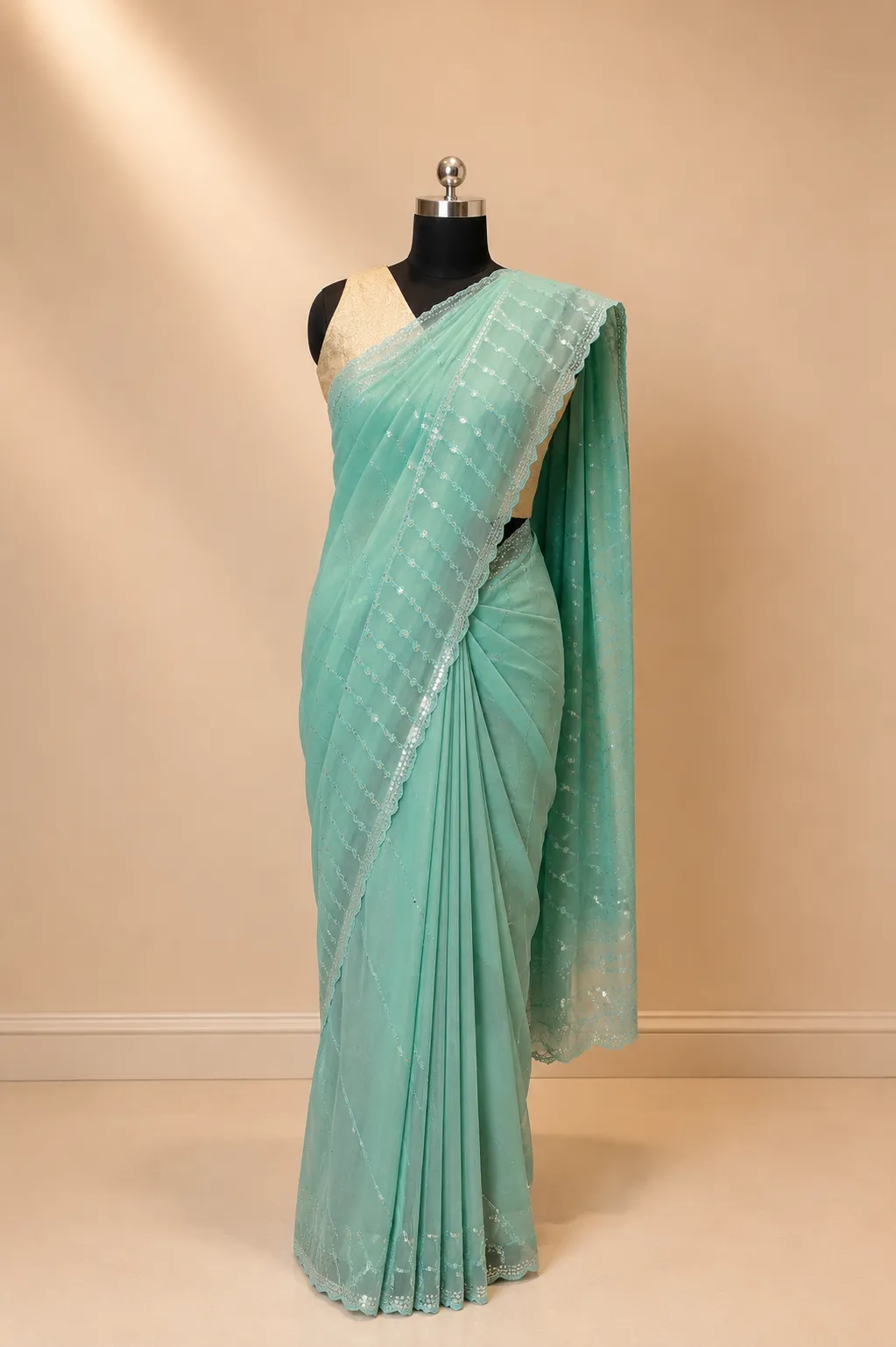 Elegant Aqua Blue Net Saree with Shimmering Sequin Wave Embroidery