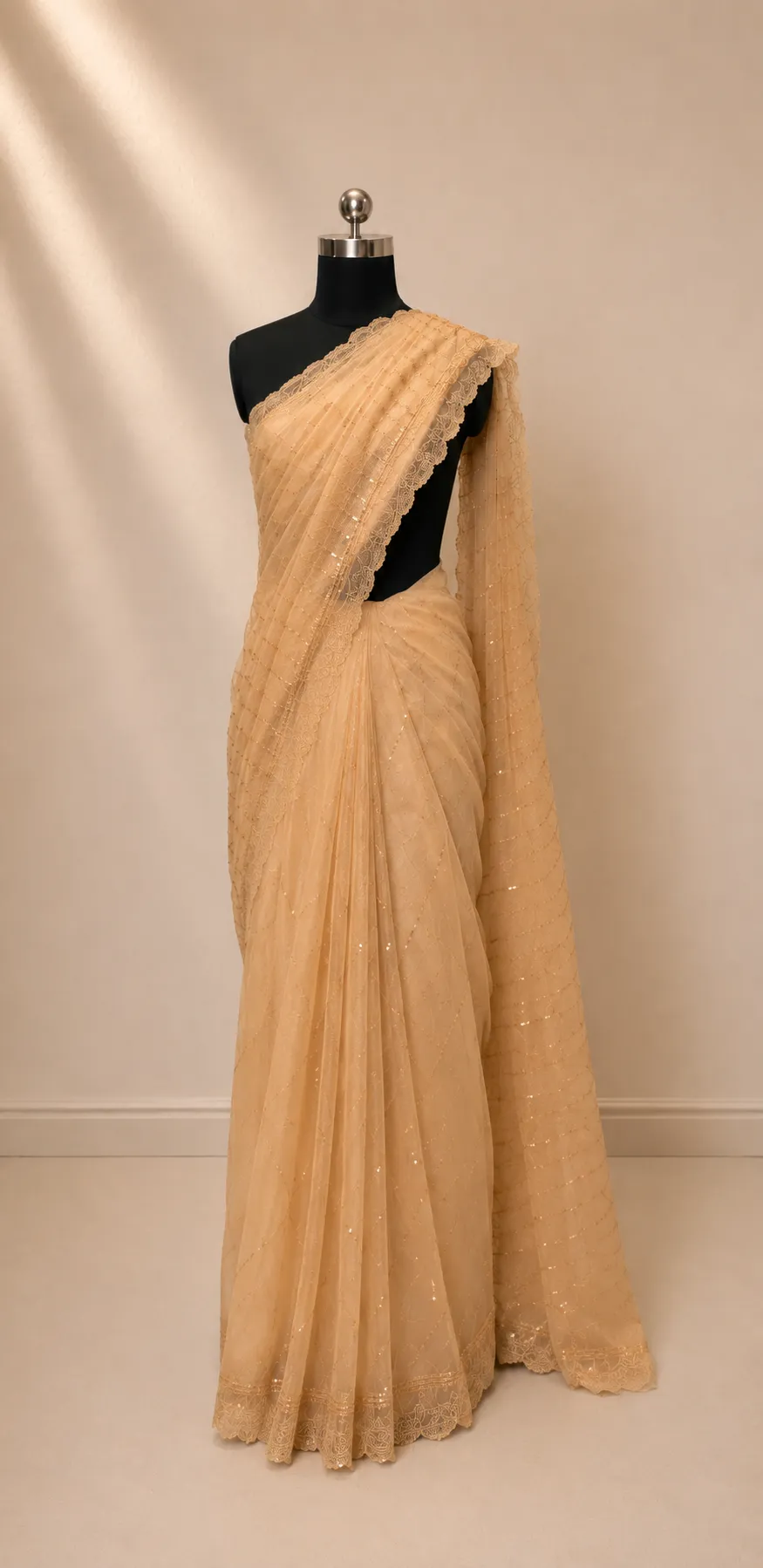 Elegant Champagne/Beige Net Saree with Shimmering Sequin Wave Embroidery